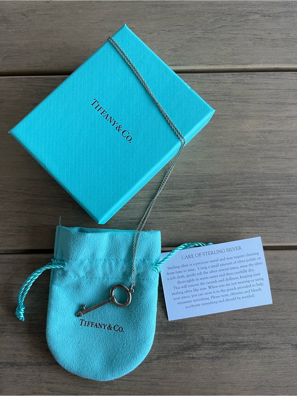 Tiffany & Co. Silver Key Pendant with Signature Blue Pouch and Box